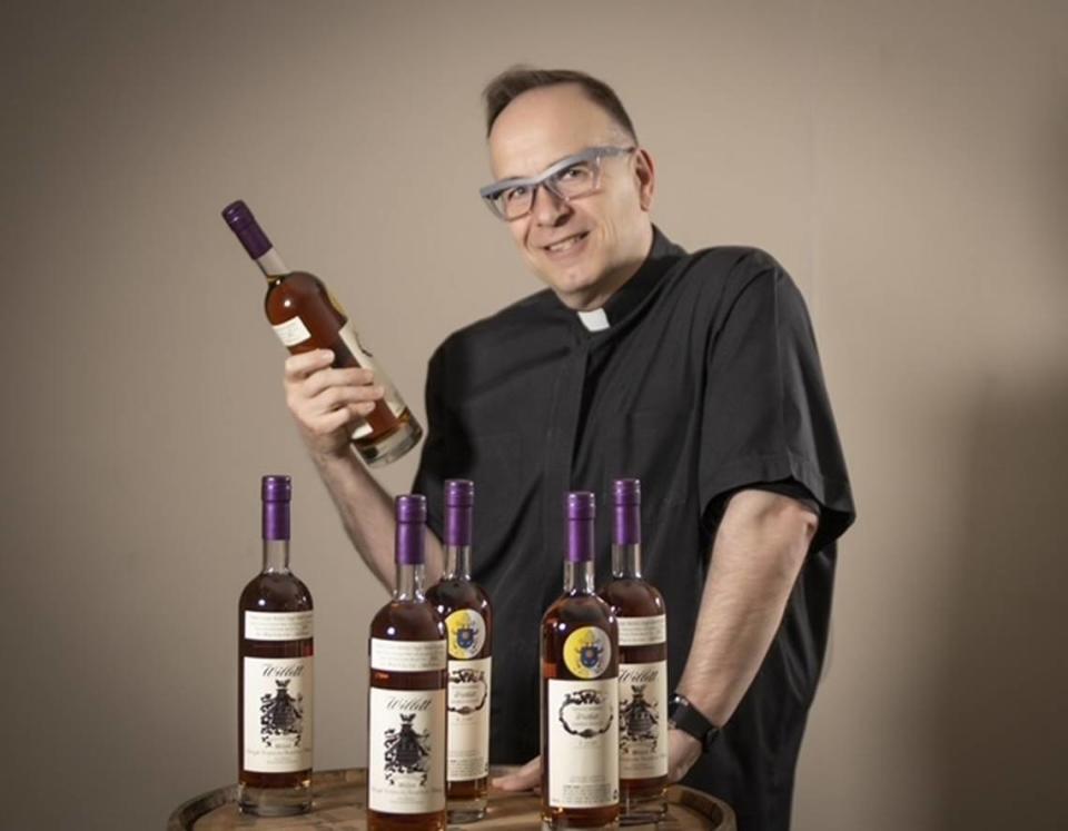 Father Jim Sichko with his Willett bourbon barrel pick.