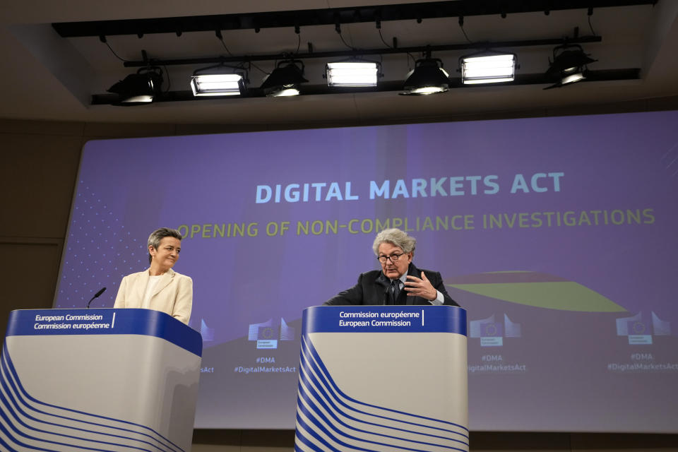 European Commissioner for Europe fit for the Digital Age Margrethe Vestager, left, and European Commissioner for Internal Market Thierry Breton address a media conference regarding the Digital Markets Act at EU headquarters in Brussels, Monday, March 25, 2024. The European Commission on Monday opened non-compliance investigations against Alphabet, Apple and Meta under the Digital Markets Act. (AP Photo/Virginia Mayo)