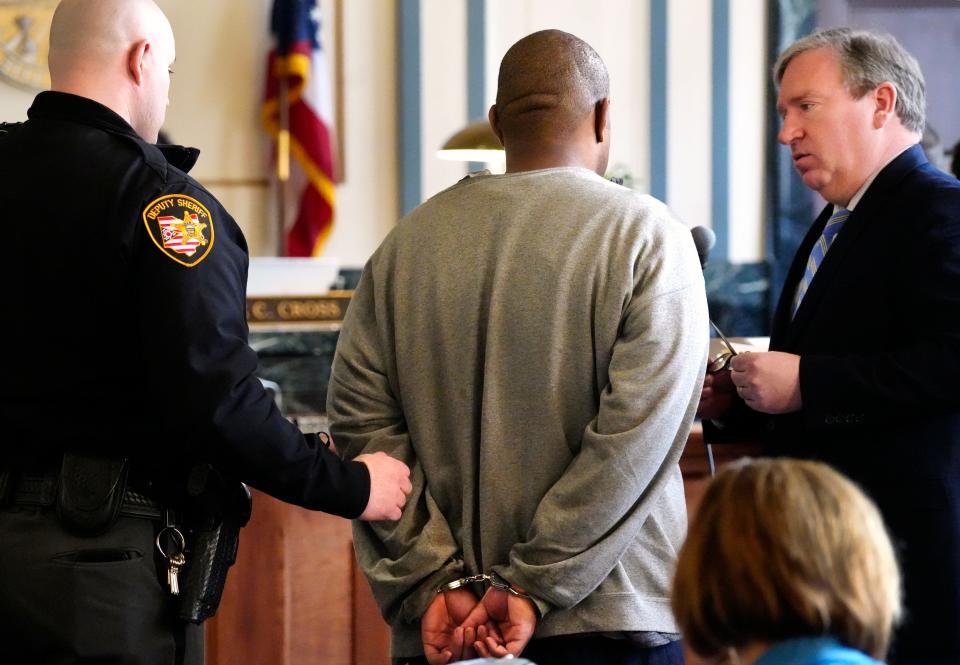 T’ontae Farley (at center) talks with his attorney Hugh McCloskey, following his sentencing in the courtroom of Hamilton County Common Pleas Judge Wende Cross, Wednesday, Jan. 3, 2024.