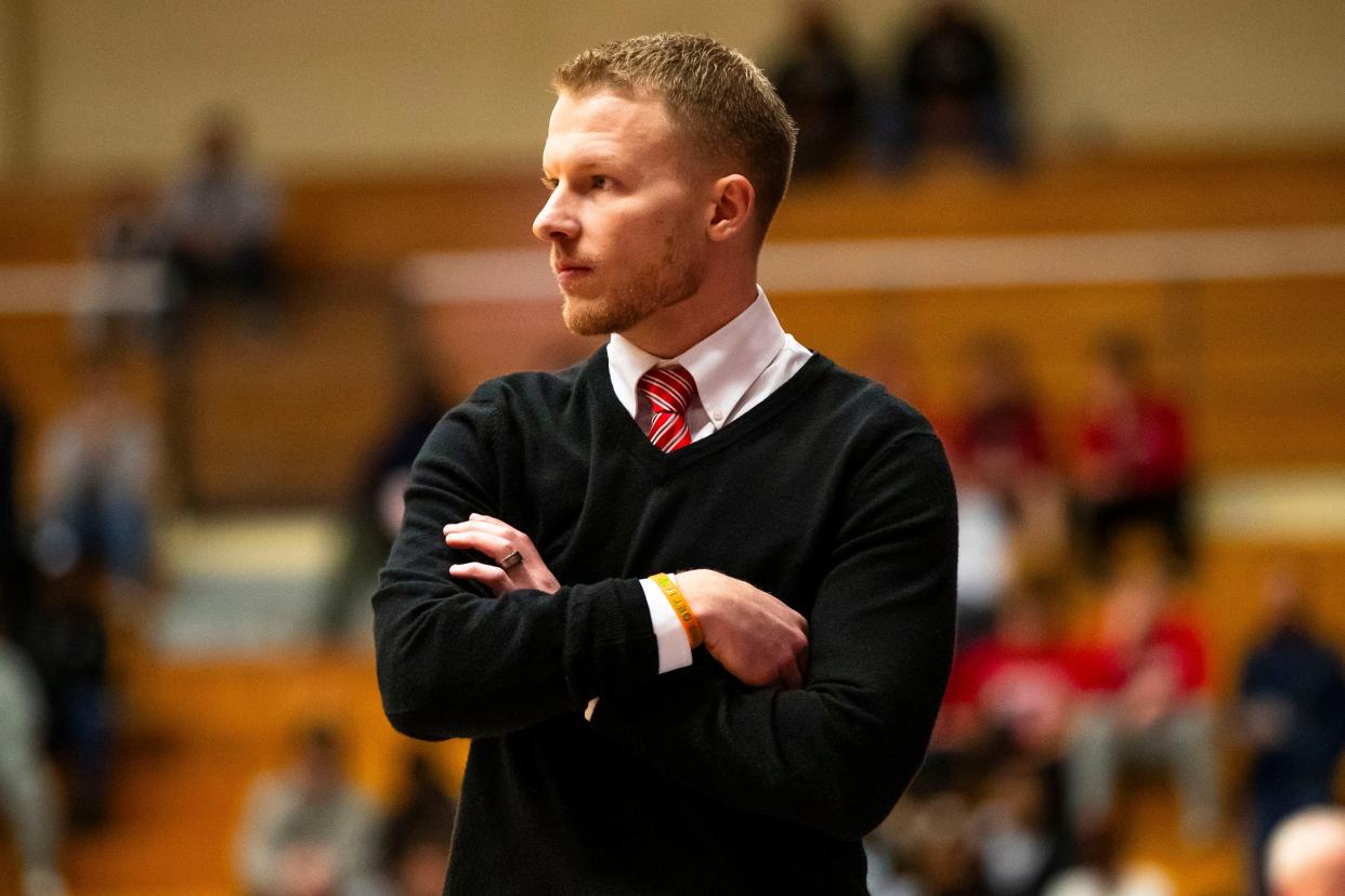 Fishers coach Garrett Winegar watches during the Fishers vs. Crown Point boys semistate basketball semifinal game Saturday, March 16, 2024 at Northside Gym in Elkhart.