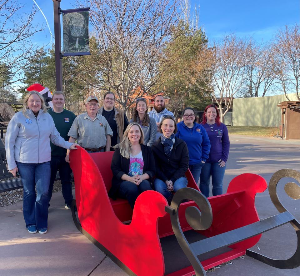 Team members of the Great Plains Zoo and Butterfly House and Aquarium who planned and designed the 2023 South Dakota Capitol Christmas Tree at the Great Plains Zoo in Sioux Falls on Wednesday, Dec. 6, 2023.