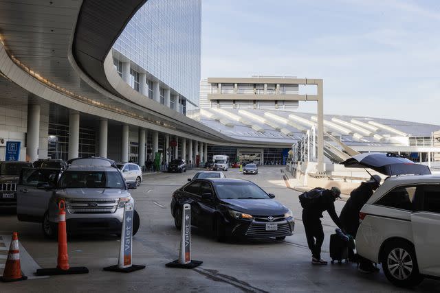 <p>Shelby Tauber/Bloomberg via Getty</p> The Dallas-Fort Worth International Airport photographed on Dec. 12, 2023