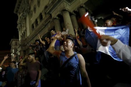 People celebrate the resignation of Guatemalan Vice President Roxana Baldetti, in Guatemala City, May 8, 2015. REUTERS/Jorge Dan Lopez