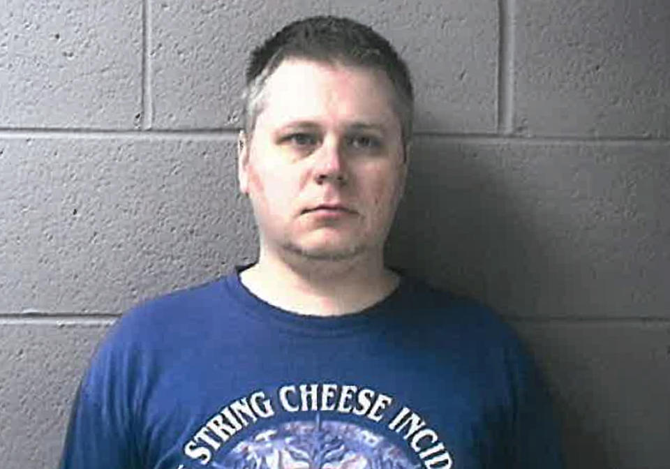 In this photo provided by the Racine County, Wis., Sheriff is James P. Eaton, 36, of Palatine, Ill. Wisconsin authorities said Tuesday, April 8, 2014 Eaton was arrested on charges of first-degree intentional homicide and hiding a corpse in connection with the cold-case slaying of Amber Creek, 14, a teenage runaway from Palatine whose battered body was found in a Wisconsin marsh in 1997. (AP Photo/Racine County Sheriff)