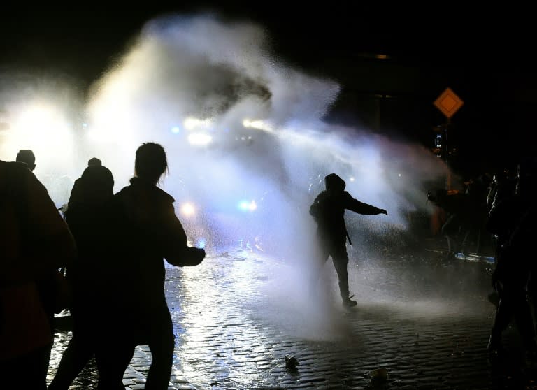 Demonstrators gathered again after the close of the summit late Saturday, with far-left protesters setting fire to a number of vehicles into the early morning hours