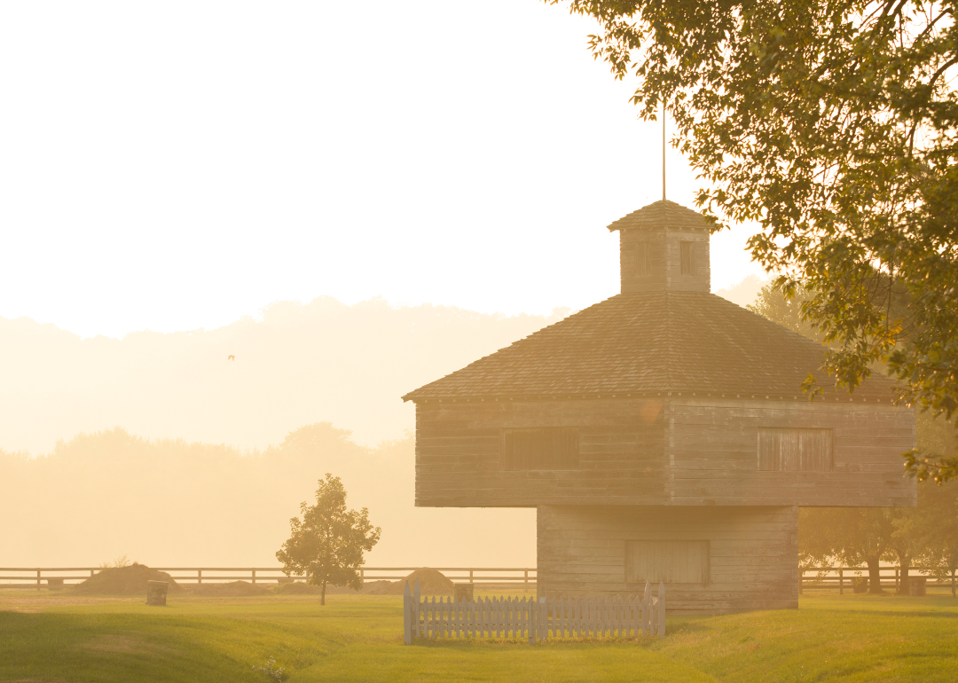 A historic home at sunset.