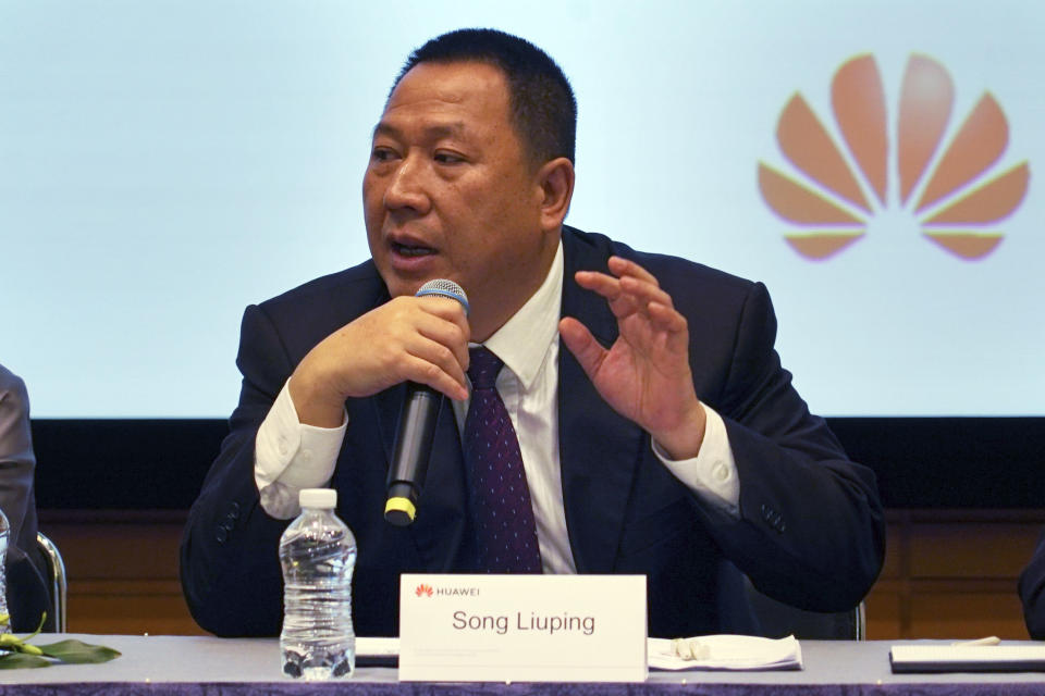 Huawei's chief legal officer Song Liuping speaks during Huawei's annual report in Shenzhen in south China's Guangdong province, Friday, March 29, 2019. Huawei is asking a U.S. federal court in a lawsuit filed this month to throw out a law that bars the Trump administration and government contractors from using its equipment. The company says that improperly punishes the company without giving it away to defend itself. (AP Photo/Dake Kang)