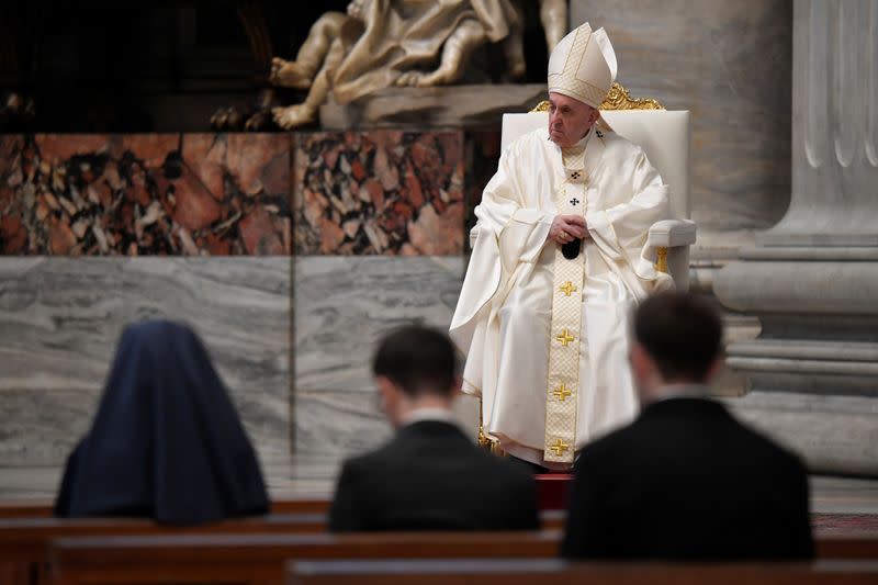 Pope Francis holds a Mass on Holy Thursday at the Vatican