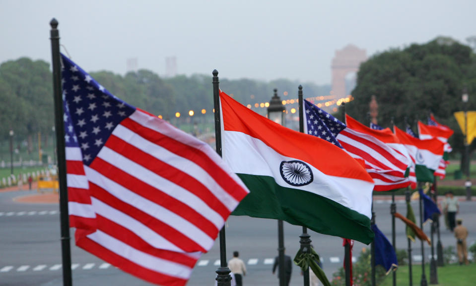 FILE - In this Feb. 27, 2006, file photo, U.S. and Indian flags flutter near the Presidential Palace in New Delhi, India, ahead of then U.S. President George W. Bush's visit to the country. India has high hopes its ties with the United States will deepen under President Joe Biden, who was a key proponent of the 2008 civil nuclear deal between the countries and whose new administration includes several Indian Americans. (AP Photo/Gurinder Osan, File)