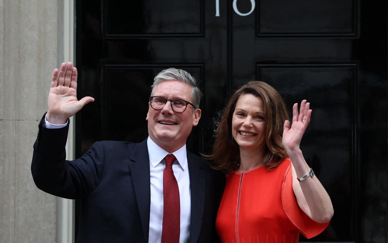 Keir Starmer poses with his wife Victoria outside Number 10 Downing Street