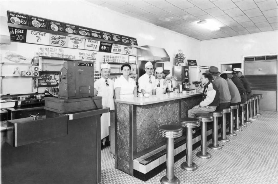 In an undated photo, customers dine at the original Nu-Way Weiners restaurant which opened in 1916. Courtesy Nu-Way Weiners