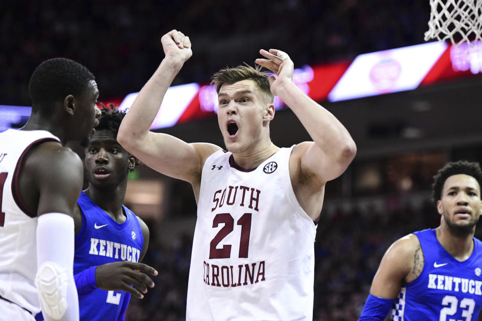 South Carolina forward Maik Kotsar (21) reacts to a an official's call during the first half of the team's NCAA college basketball game against Kentucky on Wednesday, Jan. 15, 2020, in Columbia, S.C. (AP Photo/Sean Rayford)