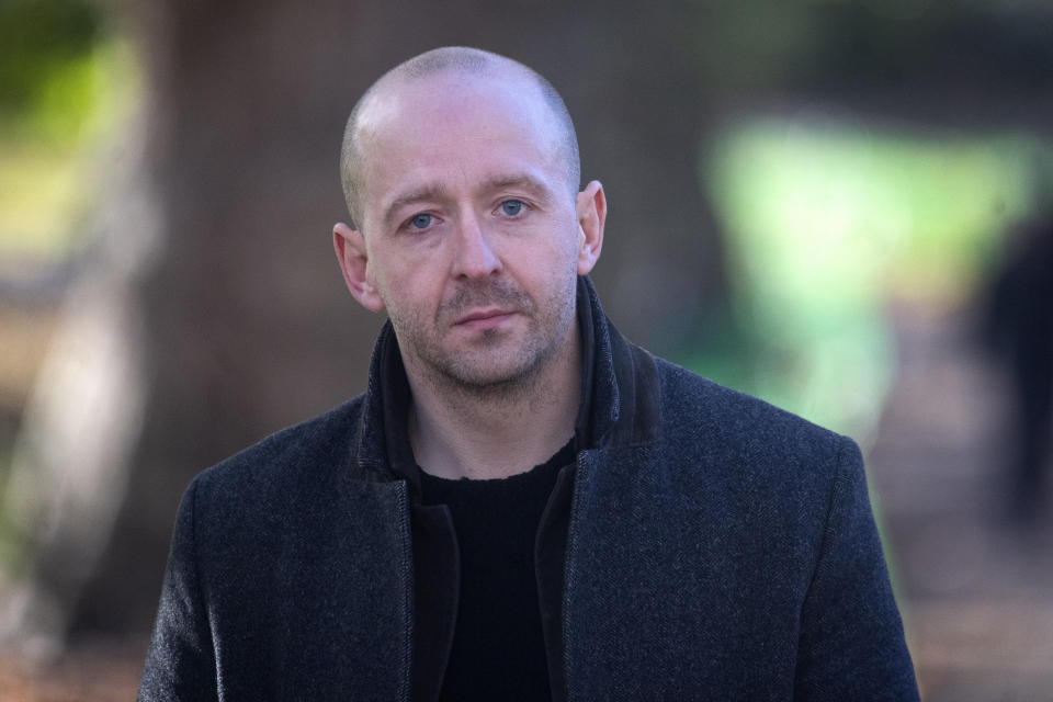 Lee Cain walks in Westminster, London, on the day after he announced that he is resigning as Downing Street's director of communications and will leave the post at the end of the year.