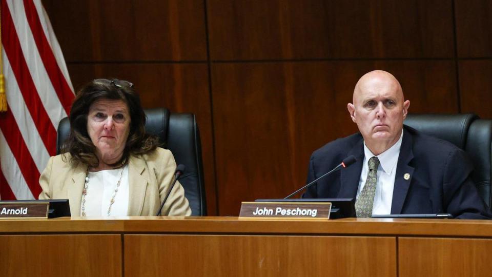 San Luis Obispo County Supervisors Debbie Arnold and John Peschong, listen to public comment Feb. 7, 2023.