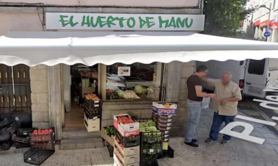 This Google Maps image of two men standing at a corner store in Spain was used to track down the mafia fugitive.