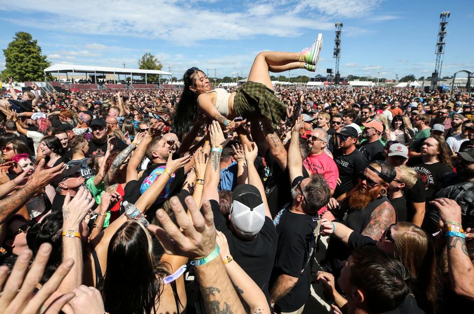 Some fans rode the wave of the crowd as New Years Day played on Thursday, the first day of Louder Than Life. Sept. 22, 2022