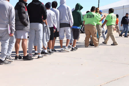 Children are seen at a tent city set up to hold immigrant children separated from their parents or who crossed the U.S. border on their own in Tornillo, Texas, U.S., in this U.S. Department of Health and Human Services (HHS) image released on October 12, 2018. Courtesy HHS/Handout via REUTERS