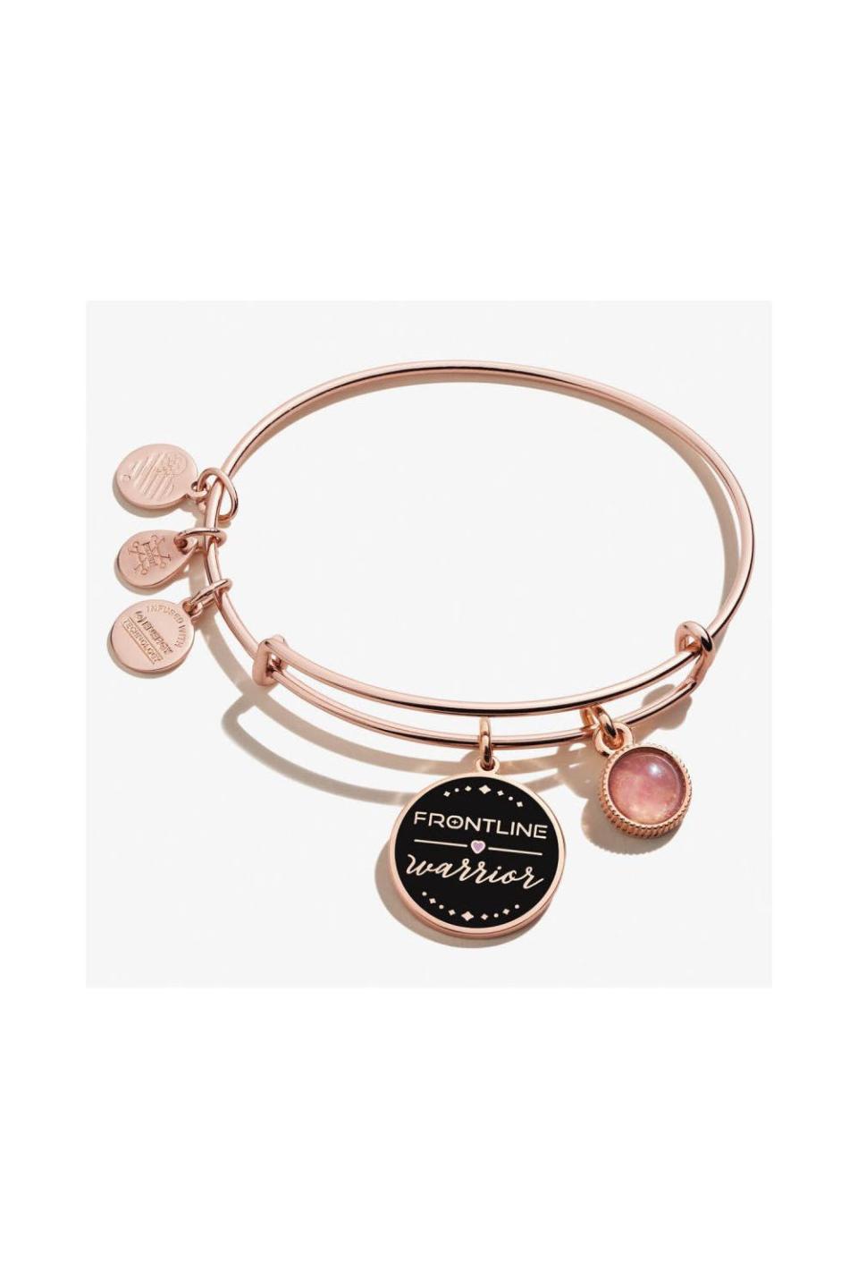 <p><strong>Alex and Ani</strong></p><p>alexandani.com</p><p><strong>$39.00</strong></p><p><a href="https://go.redirectingat.com?id=74968X1596630&url=https%3A%2F%2Fwww.alexandani.com%2Fcolor-infusion-frontline-warrior-duo-charm-expandable-wire-bangle-shiny-rose-gold.html&sref=https%3A%2F%2Fwww.redbookmag.com%2Flife%2Fg34770397%2Fgifts-that-give-bac1%2F" rel="nofollow noopener" target="_blank" data-ylk="slk:SHOP NOW;elm:context_link;itc:0;sec:content-canvas" class="link ">SHOP NOW</a></p><p>Show a frontline hero how much they mean to you with this rose gold expandable bangle. Ten percent of net sales will go to the <a href="https://1strcf.org/" rel="nofollow noopener" target="_blank" data-ylk="slk:First Responders Children's Foundation;elm:context_link;itc:0;sec:content-canvas" class="link ">First Responders Children's Foundation</a>, which provides grants to first responders financially affected by COVID-19 and sets up scholarships for children who lost a parent on the frontline. </p>