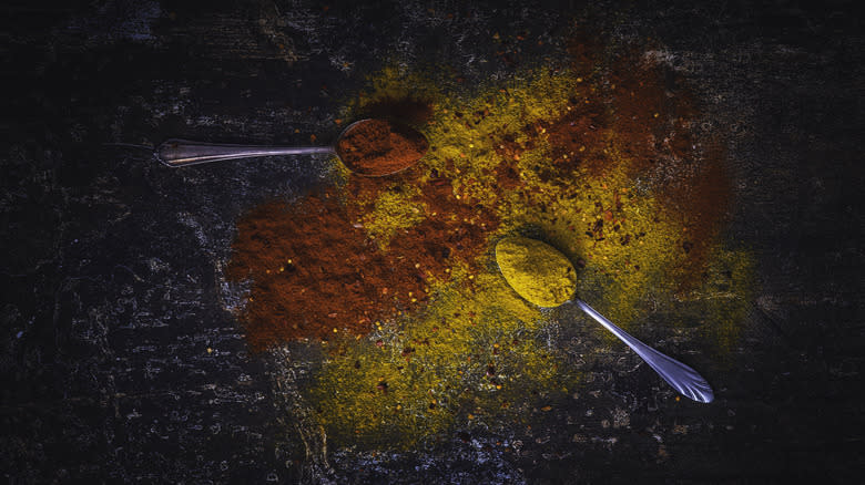 spices on black background