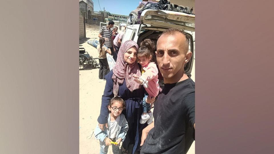 PHOTO: Amjad Abu Zaiter with his family evacuating Rafah in Southern Gaza, his daughter Julia, in her mother's arms.  (Amjad Abu Zaiter)