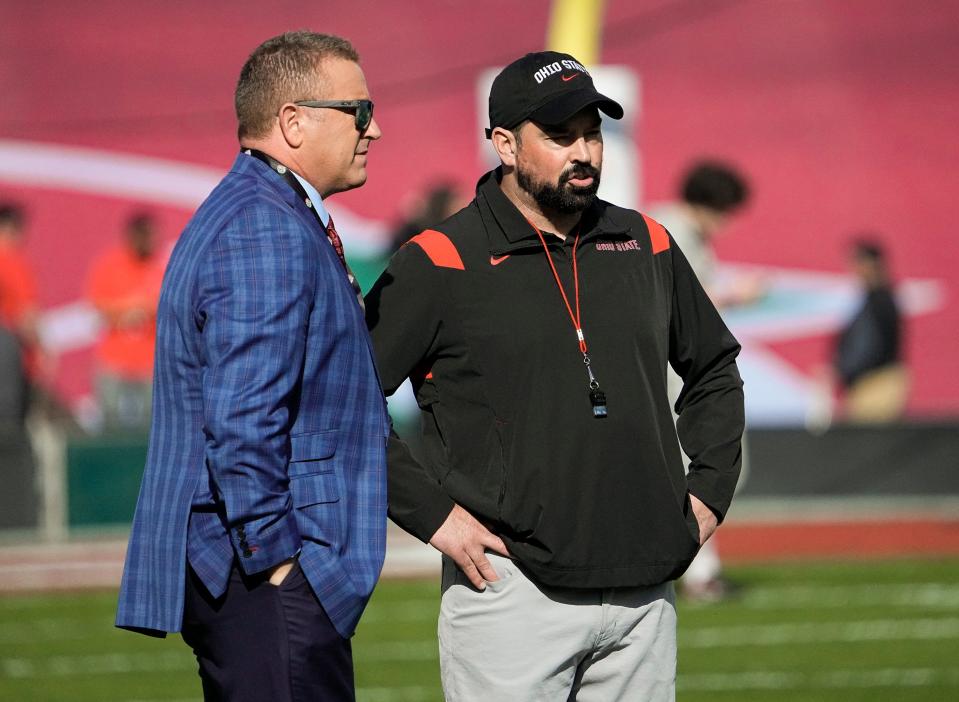 ABC broadcaster Kirk Herbstreit talks to Ohio State Buckeyes head coach Ryan Day prior to the Rose Bowl in Pasadena, Calif. on Jan. 1, 2022.