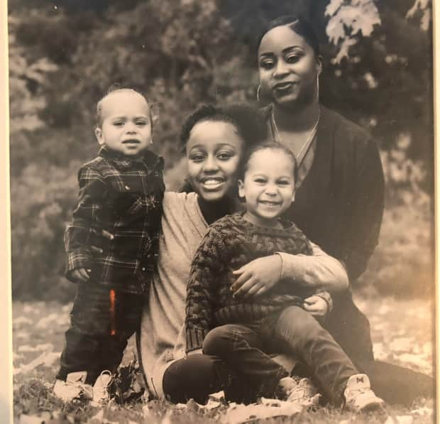 Clockwise from top right: Josslyn Mounsey and her children Kayto, Laniyah and Alton. She's filed a complaint with the Human Rights Tribunal of Ontario after she was fired from her well-paying dispatcher job at Metrolinx in 2019.