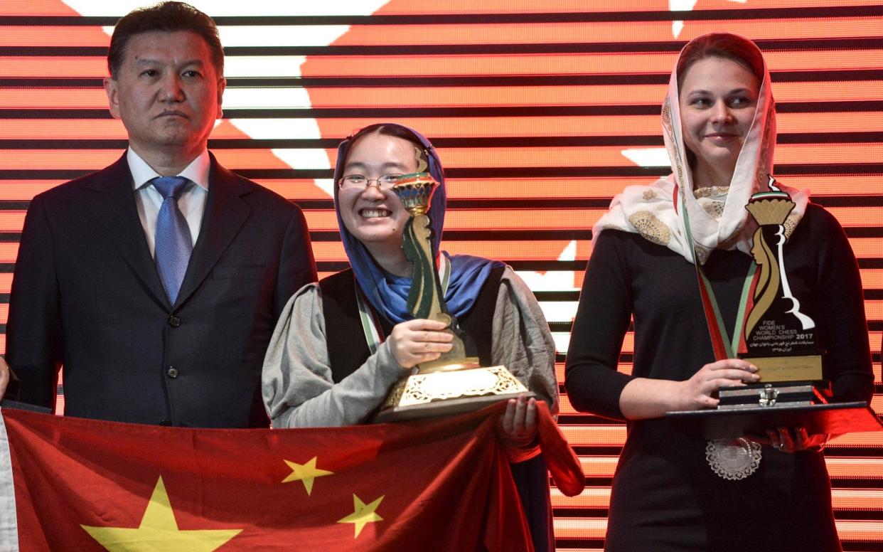 Kirsan Ilyumzhinov (left) at the presentation ceremony for the Women's World Chess Championship final in Tehran, Iran - EPA