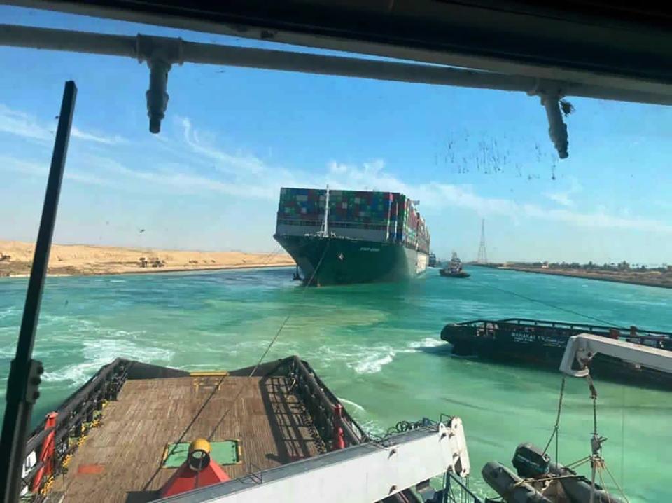 The Ever Given is accompanied by Suez Canal tugboats as it finally movesAP