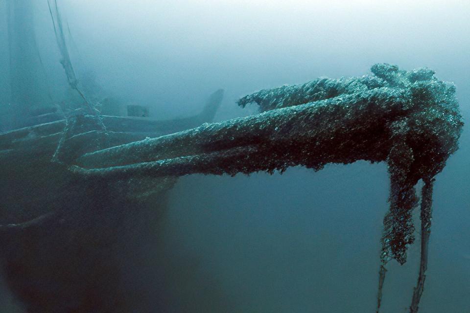 In this image taken from video provided by the Thunder Bay National Marine Sanctuary, the bowsprit of the Ironton is seen in Lake Huron off Michigan's east coast in a June 2021 photo. Searchers have found the long-lost Great Lakes ship that came to a tragic end. Officials with the sanctuary in Alpena, Mich,, say they've located the Ironton, a freight schooner that plunged to the bottom of Lake Huron in 1894. The Ironton collided with another vessel in rough seas. Reports at the time said the seven-member crew scrambled into a lifeboat but it was tethered to the ship and pulled down. Five crewmen died.