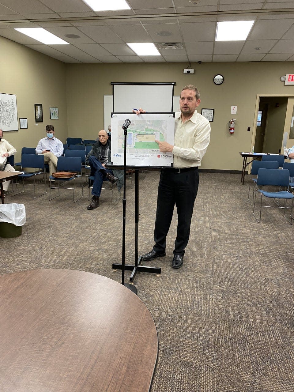 Greg Seifert, design development architect at Geis Companies, shows plans for LG Chem to the Ravenna Planning Commission.