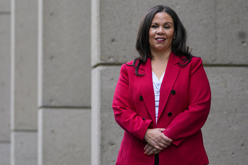 Natalie R. Coles, vice president & chief development officer at Wilberforce University, poses on the campus in Wilberforce, Ohio, Friday, May 12, 2023. Coles will never forget receiving an unexpected phone call in 2020. On the line was Virginia-based Dominion Energy, asking to give money to Wilberforce University, the small historically Black college where she is in charge of fundraising. (AP Photo/Michael Conroy)