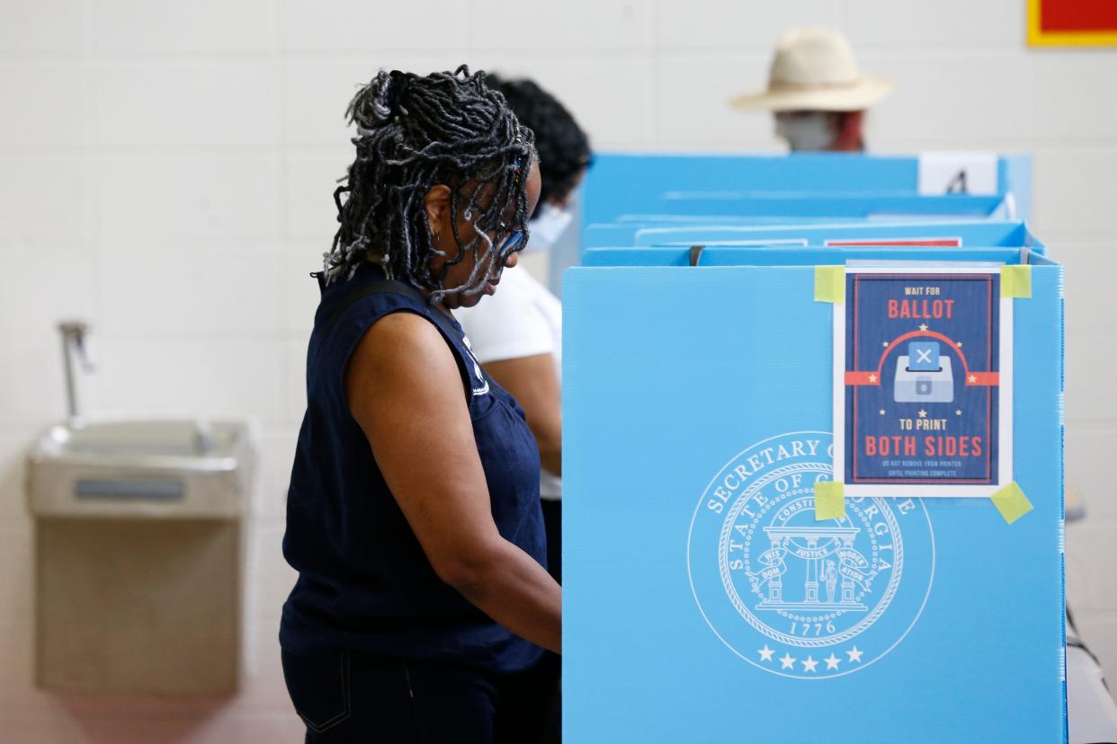 Locals vote at Clarke Central High School on Election Day in Athens on May 24, 2022.