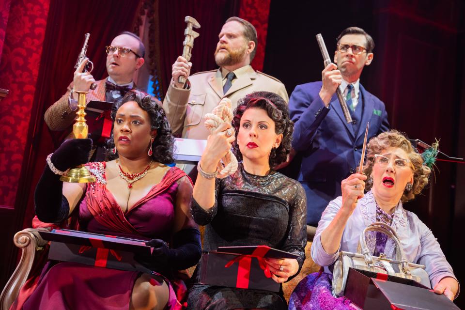 Front row, from left: Michelle Elaine (as Miss Scarlet), Joanna Glushak (Mrs. Peacock) and Tari Kelly (Mrs. White); back row, from left: Jonathan Spivey Professor Plum), John Treacy Egan (Colonel Mustard) and John Shartzer (Mr. Green) in the North American tour of “Clue.”