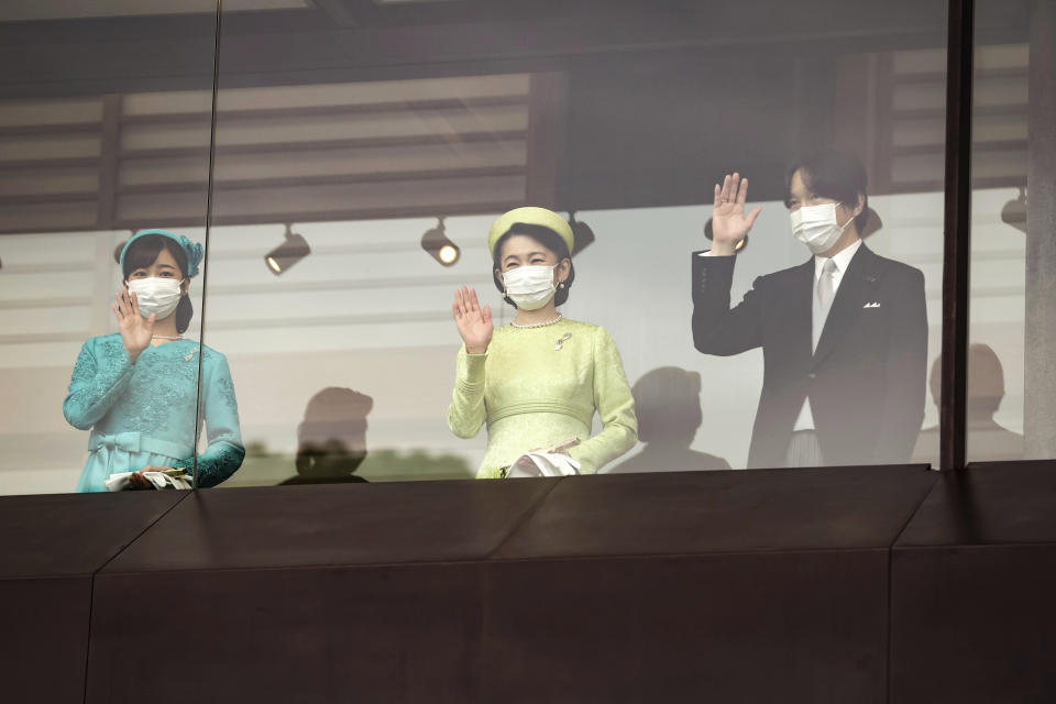 Japanese Crown Prince Akishino, right, his wife Crown Princess Kiko and their daughter Princess Kako greet the public during the emperor's 63rd birthday celebration at the Imperial Palace in Tokyo, Thursday, Feb. 23, 2023. (Takashi Aoyama/Pool Photo via AP)