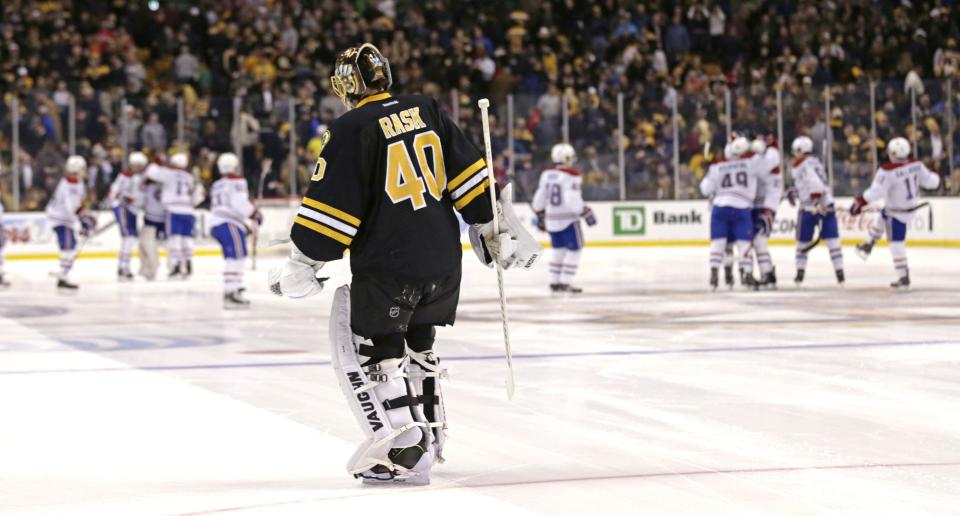 Boston Bruins goalie Tuukka Rask (40) skates to the bench after giving up the game winning goal by Montreal Canadiens center Alex Galchenyuk in a shootout during an NHL hockey game, Monday, March 24, 2014, in Boston. The Canadiens defeated the Bruins 2-1. (AP Photo/Charles Krupa)