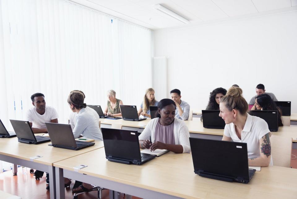 <span class="caption">Financial concerns are a big barrier for students wishing to apply to graduate school. </span> <span class="attribution"><a class="link " href="https://www.gettyimages.com/detail/photo/training-class-students-learning-at-pc-discussion-royalty-free-image/607900886?adppopup=true" rel="nofollow noopener" target="_blank" data-ylk="slk:SilviaJansen/E+ via Getty Images;elm:context_link;itc:0;sec:content-canvas">SilviaJansen/E+ via Getty Images</a></span>