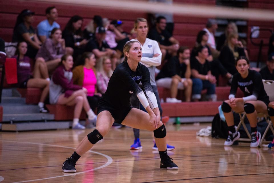 CSN's Kelly McAuley digs a volleyball Saturday afternoon at the Wildcat Invite in Estero. CSN won the tournament, going 5-0.