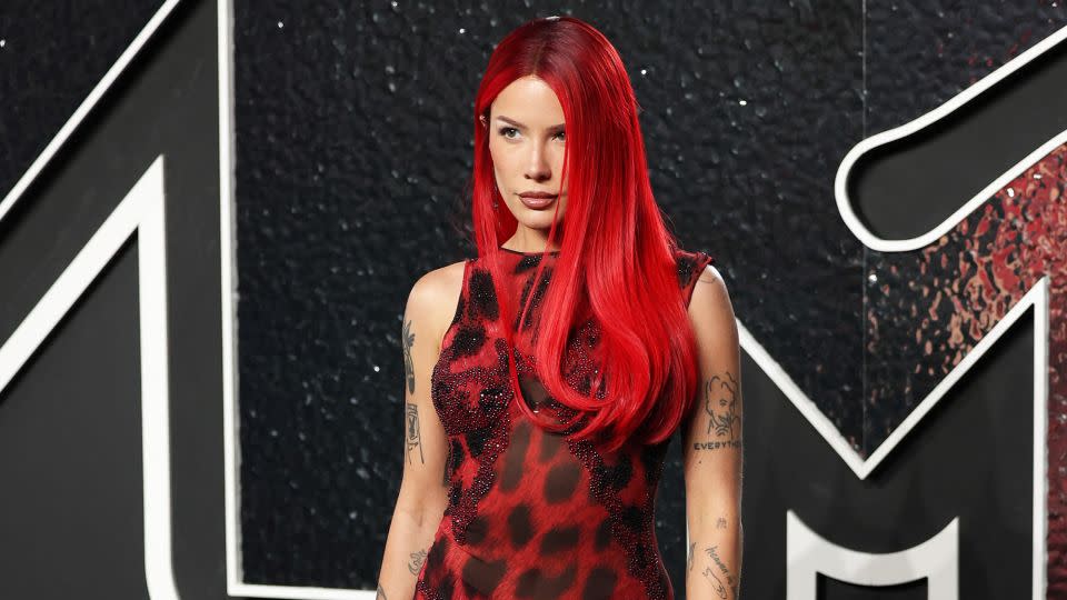 Halsey wore an archive Versace gown that she said was last worn by Elizabeth Hurley in 1996. - Andrew Kelly/Reuters