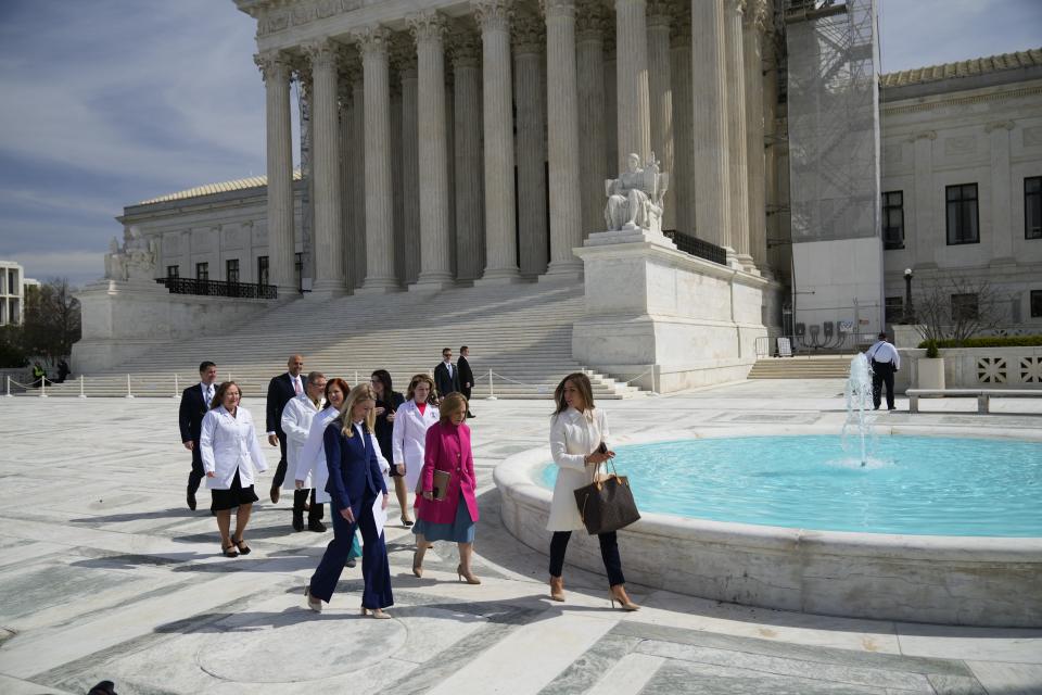 Lawyer Erin Hawley of the Alliance Defending Freedom and wife of U.S. Senator Josh Hawley (R-MO), far left, walks towards the media with a team of lawyers and doctors outside the U.S. Supreme Court as justices hear oral arguments in a bid by President Joe Biden's administration to preserve broad access to the abortion pill, outside the court in Washington, U.S., March 26, 2024