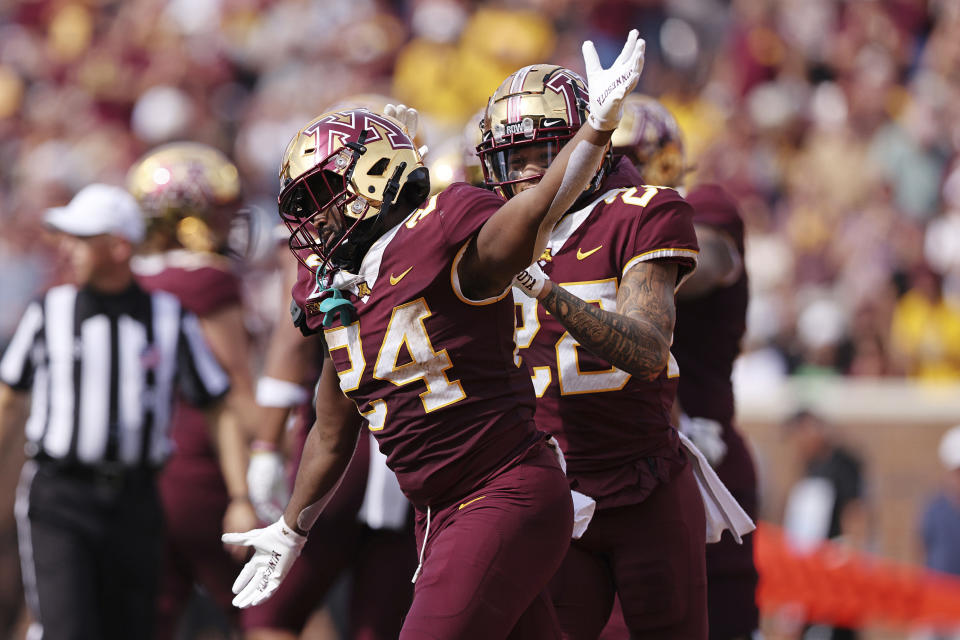 Minnesota running back Mohamed Ibrahim (24) celebrates after scoring a touchdown against Colorado during the first half of an NCAA college football game, Saturday, Sept. 17, 2022, in Minneapolis. (AP Photo/Stacy Bengs)