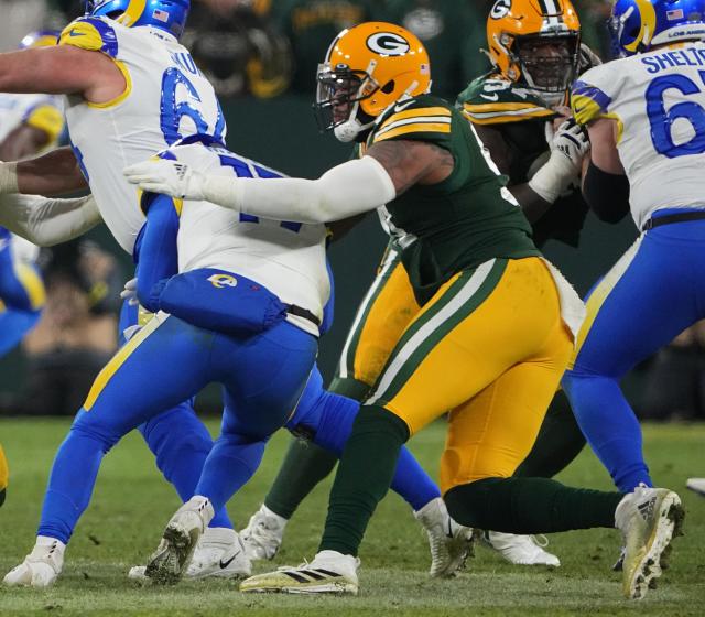 Green Bay Packers nose tackle Kenny Clark (97) reacts after a sack during  an NFL divisional playoff football game against the San Francisco 49ers,  Saturday, Jan 22. 2022, in Green Bay, Wis. (