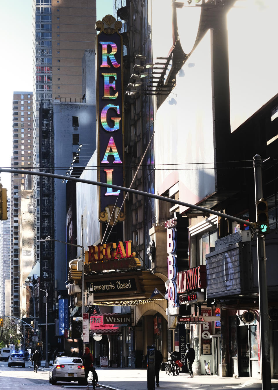 FILE - The Regal E-Walk movie theater is closed during the city lockdown due to the pandemic in New York on May 13, 2020. Regal movie theaters have been closed for almost five months in the U.S. due to the coronavirus pandemic, but they are gearing up to open on Aug. 21. (Photo by Evan Agostini/Invision/AP, File)