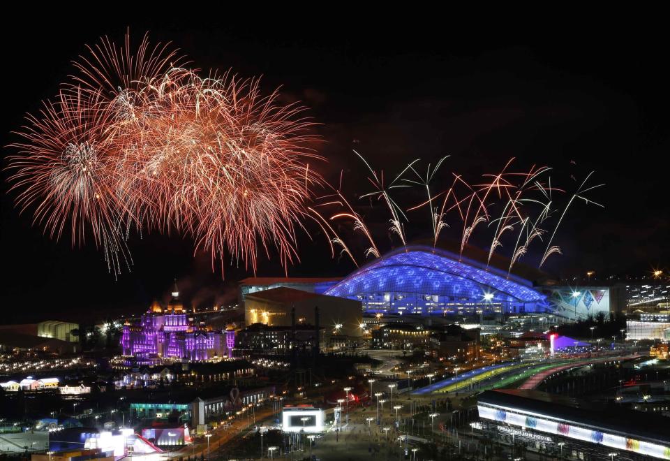 Fireworks are seen over the Olympic Park during the rehearsal of the opening ceremony at the Adler district of Sochi, February 1, 2014. Sochi will host the 2014 Winter Olympic Games from February 7 to February 23. REUTERS/Alexander Demianchuk (RUSSIA - Tags: SPORT OLYMPICS)