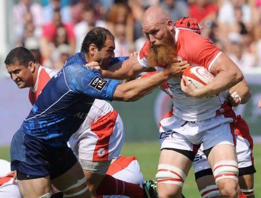 Biarritz's second row Erik Lund (R) clashes with Montpellier's second row Mamuka Gorgodze during their French Top 14 rugby union match at the Aguilera stadium in Biarritz, southwestern France. Biarritz made it four wins from four games this season in the Top 14 as they thrashed Montpellier 27-8