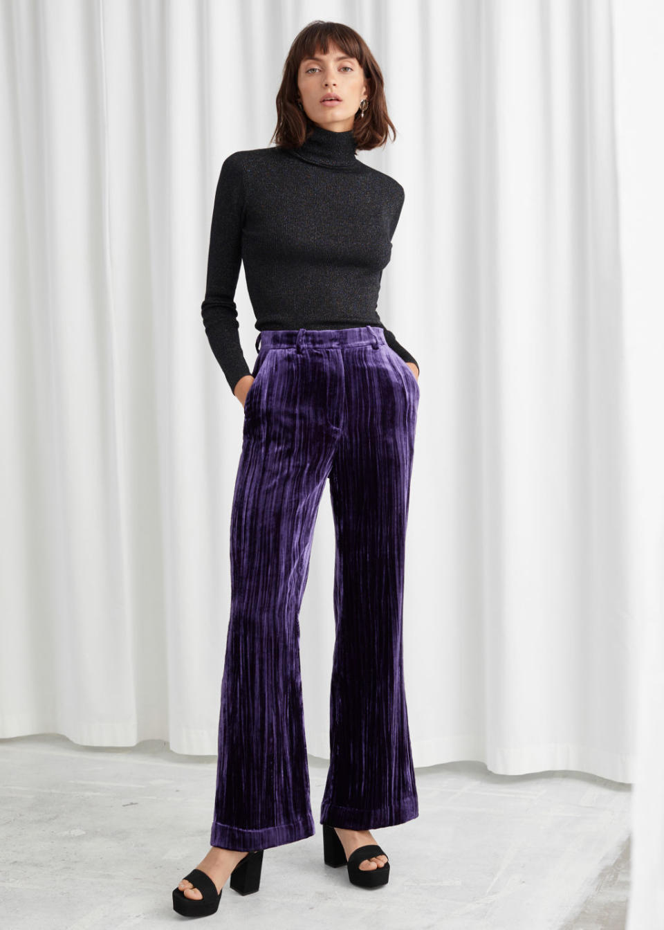 & Other Stories crushed velvet kick flare trousers. (Credit: & Other Stories)