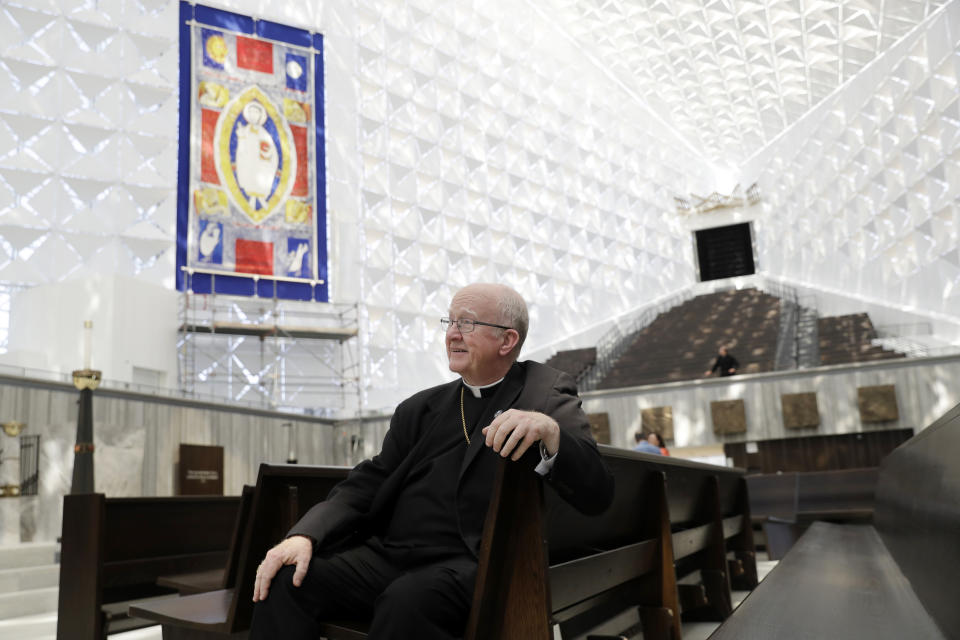 Kevin Vann, Bishop of Orange County, poses for a photo inside the newly renovated Christ Cathedral Monday, July 8, 2019, in Garden Grove, Calif. The 88,000-square-foot Catholic church has undergone a $77 million renovation. (AP Photo/Marcio Jose Sanchez)