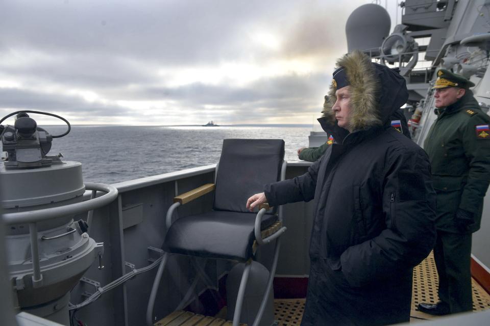 Russian President Vladimir Putin watches a navy exercise from the Marshal Ustinov missile cruiser in the Black Sea in Crimea, Thursday, Jan. 9, 2020. The drills involved warships and aircraft that launched missiles at practice targets. (Alexei Druzhinin, Sputnik, Kremlin Pool Photo via AP)