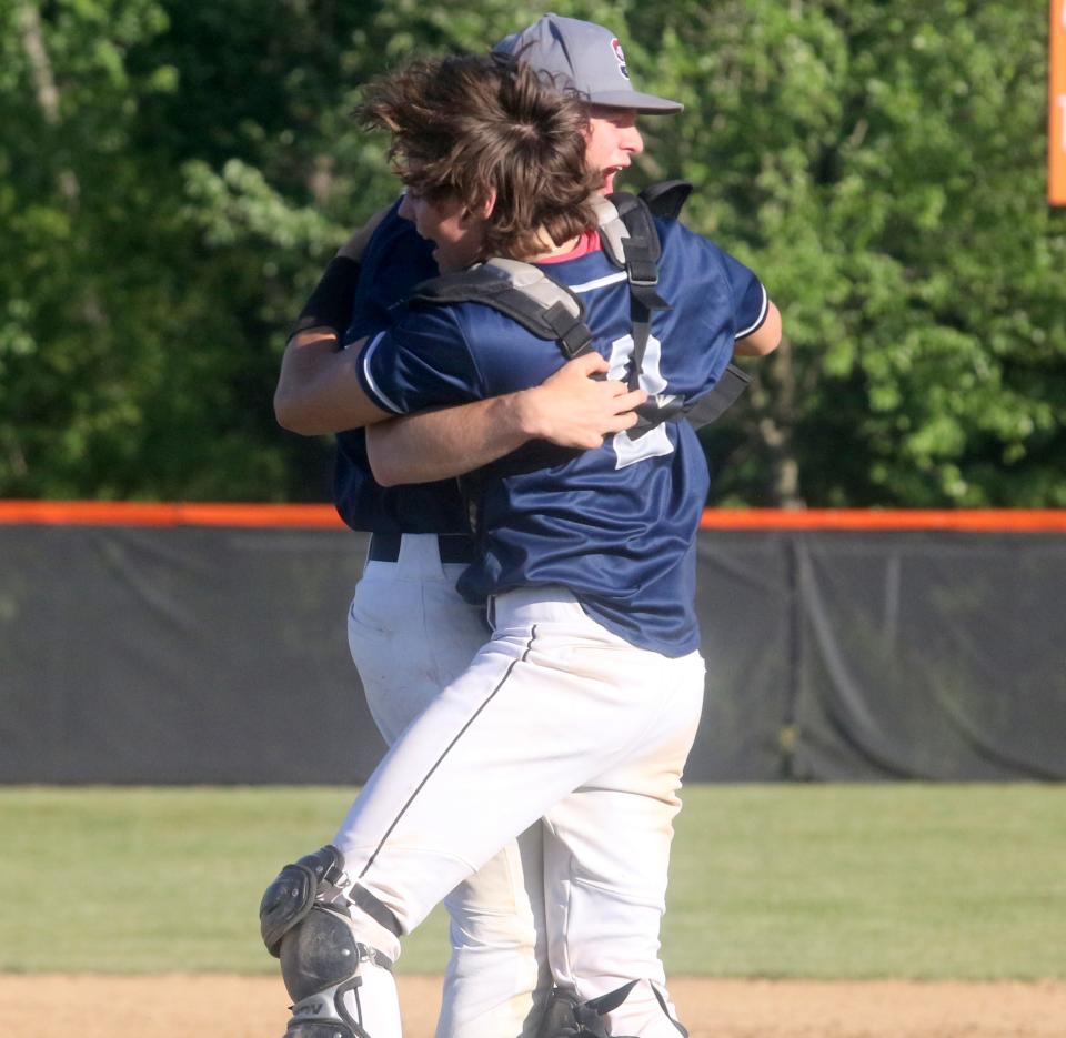 Watkins Glen/Odessa-Montour's Daniel Lewis and Brady Cannon, front, celebrate a 6-4 win over Bainbridge-Guilford in the Section 4 Class C baseball championship game May 26, 2023 at Union-Endicott High School.