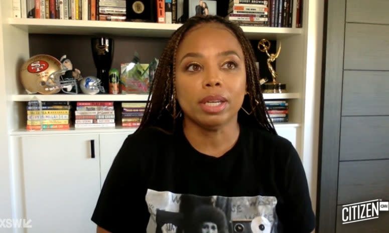 Jemele Hill looks off into the distance during a virtual conference.