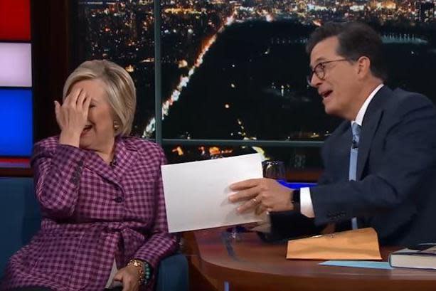 Stephen Colbert hands Hillary Clinton the picture of the naked men originally planned to celebrate her victory: CBS